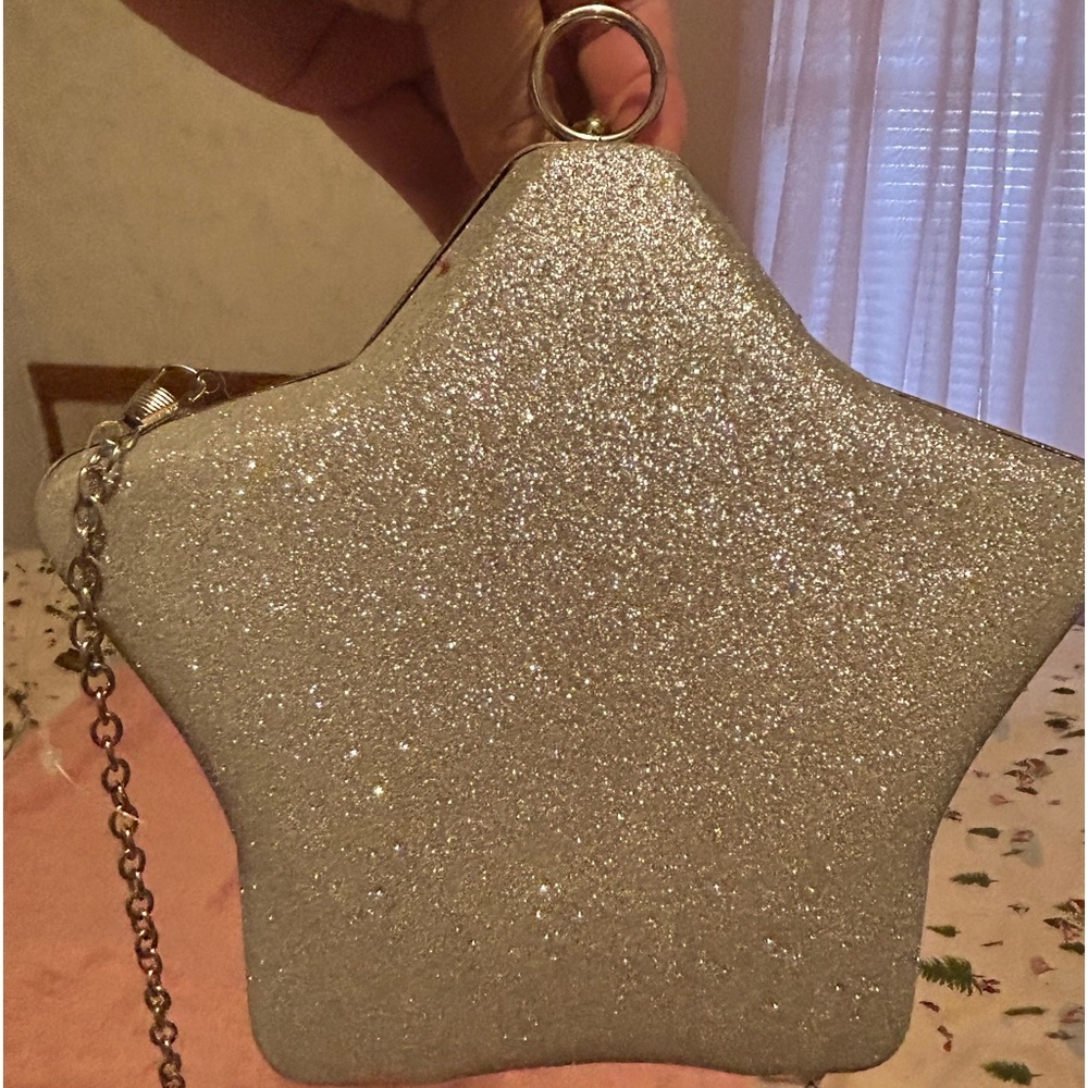 Silver sparkling star shaped purse